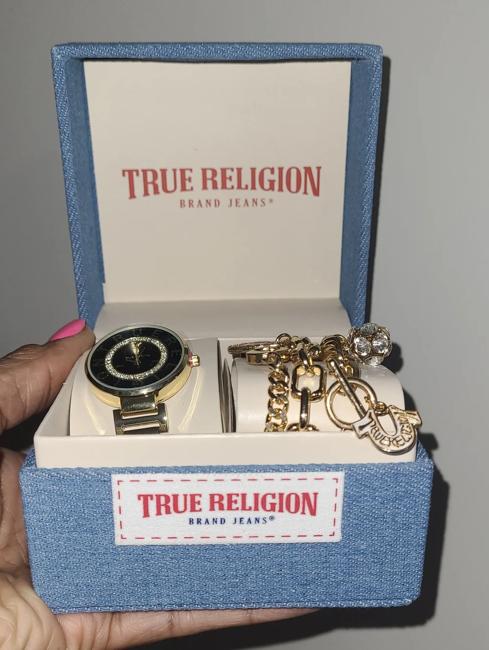 True Religion Gold-Tone Watch with Black Dial and Charm Bracelet